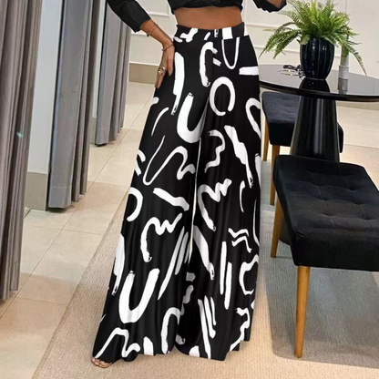 LeRoxy | Damesbroek met wijde pijpen en artistieke print | Comfortabele high-waist pasvorm