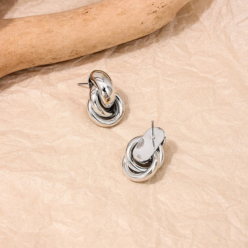 LeRoxy | Gold & Silver Knot Hoops | Elegante Oorbellen voor Elke Gelegenheid